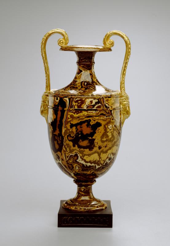 WEDGWOOD, Staffordshire, Stoke-on-Trent (manufacturer)<br />
 WEDGWOOD & BENTLEY, Staffordshire (manufacturer)<br/>
<em>Vase</em> (1769-1780) <!-- (full view) --><br />

earthenware (agate)<br />
28.4 x 13.8 x 11.5 cm<br />
National Gallery of Victoria, Melbourne<br />
Presented through The Art Foundation of Victoria by Mrs Norma Deutsher, Governor, 1992<br />
D9-1992<br />

<!--21270--><br/><a class="col-link block" href="/explore/collection/work/21270"><strong>Collection page <i class="fa fa-angle-right"></i></strong></a>