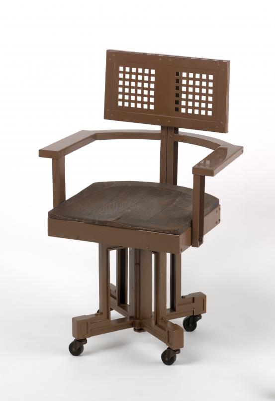 Frank Lloyd WRIGHT (designer)<br/>
<em>Office chair, from the Larkin Company Administration Building, Buffalo, New York</em> (1904-1906) <!-- (3/4 front view    ) --><br />

steel, oak, rubber, metal<br />
96.6 x 64.5 x 55.1 cm<br />
National Gallery of Victoria, Melbourne<br />
Purchased through The Art Foundation of Victoria with the assistance of the T. H. Lustig and Moar Families, Governor, 1983<br />
D21-1983<br />
&copy; Frank Lloyd Wright Estate/ARS, New York. Licensed by Copyright Agency, Australia
<!--20836-->