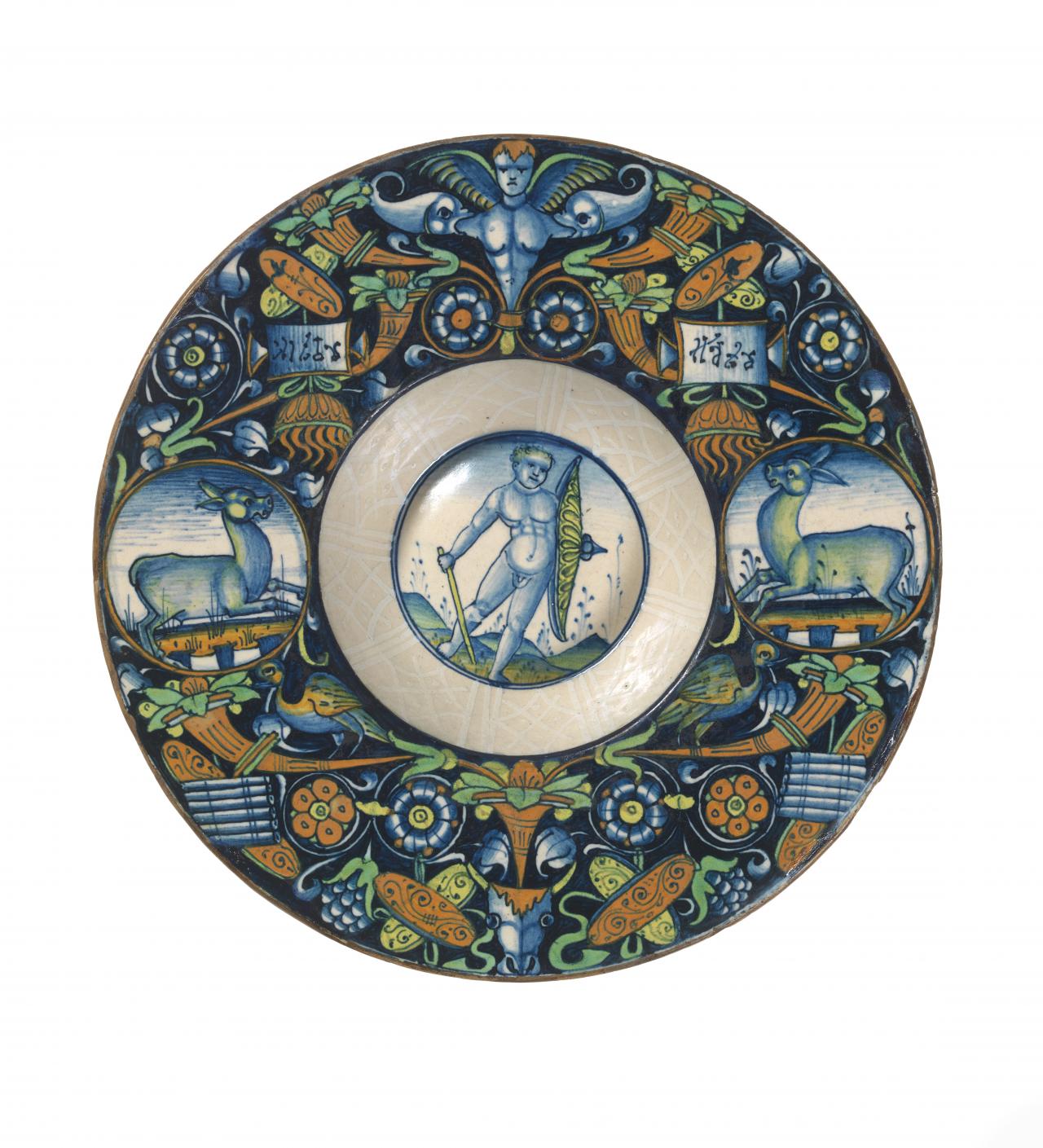 ITALY, (Pesaro) (manufacturer)<br/>
<em>Plate</em> (c. 1490-1500) <!-- (recto) --><br />

earthenware (maiolica)<br />
4.6 x 24.5 cm diameter<br />
National Gallery of Victoria, Melbourne<br />
Felton Bequest, 1940<br />
4675-D3<br />

<!--17768-->