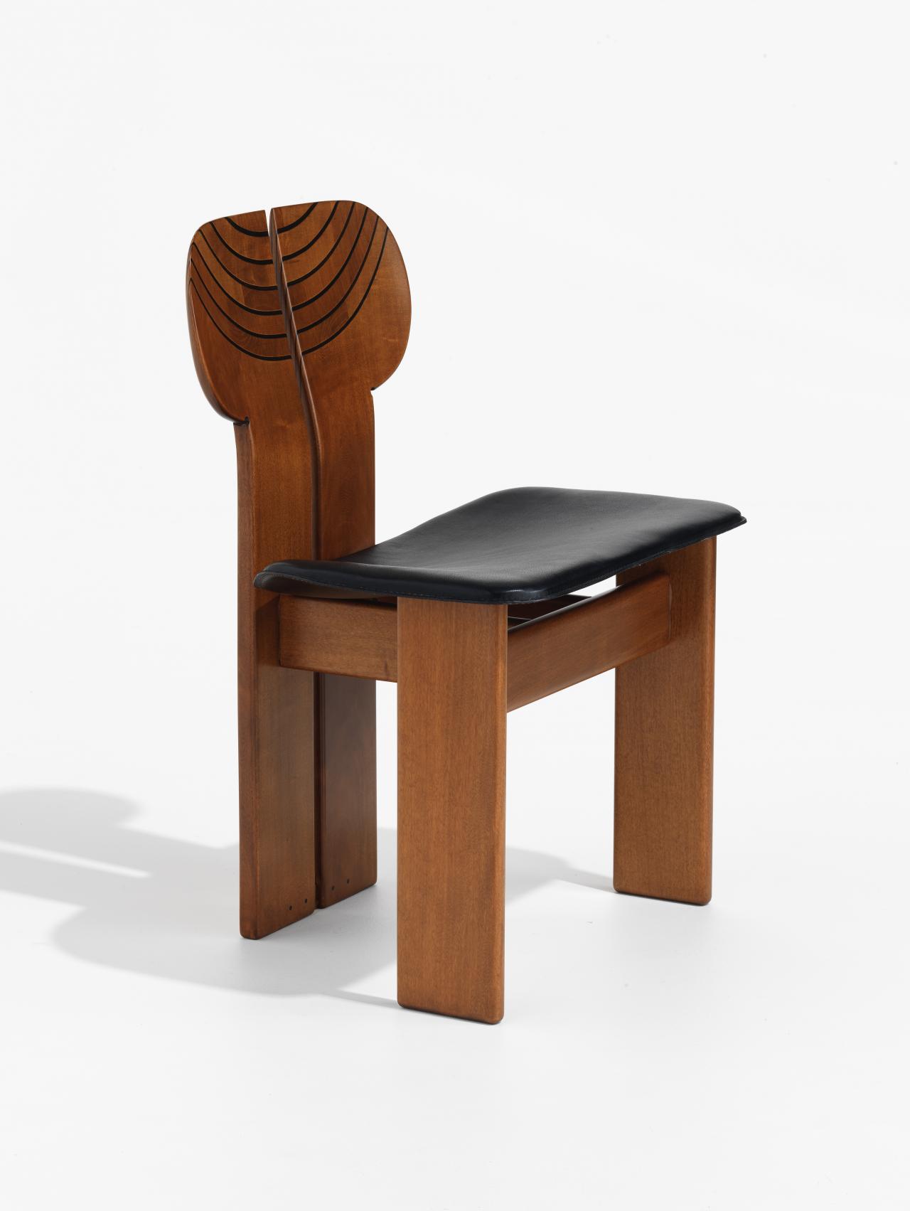 Afra SCARPA (designer)<br />
 Tobia SCARPA (designer)<br />
 B. & B. ITALIA (manufacturer)<br/>
<em>Artona chair</em> (1975) <!-- (full view) --><br />

Walnut (Juglans sp.), ebony (Diospyros sp.), leather, (other materials)<br />
78.0 x 55.8 x 48.0 cm<br />
National Gallery of Victoria, Melbourne<br />
Presented by B & B Italia (Maxalto) & Design 250 Pty Ltd, 1976<br />
D78-1976<br />

<!--20718-->