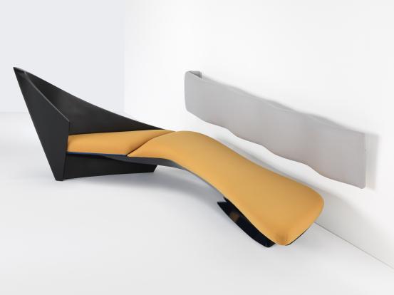 Zaha HADID (designer)<br/>
<em>Wave sofa</em> (1988) <!-- (full view) --><br />

fibreglass, plywood, polyurethane foam, wool, (other materials), velcro, metal<br />
(a-b) 119.7 x 357.7 x 238.8 cm (variable) (overall)<br />
National Gallery of Victoria, Melbourne<br />
Presented by Denton Corker Marshall through the Australian Government's Cultural Gifts Program, 2018<br />
2018.1140<br />
&copy; Zaha Hadid Foundation
<!--118250-->