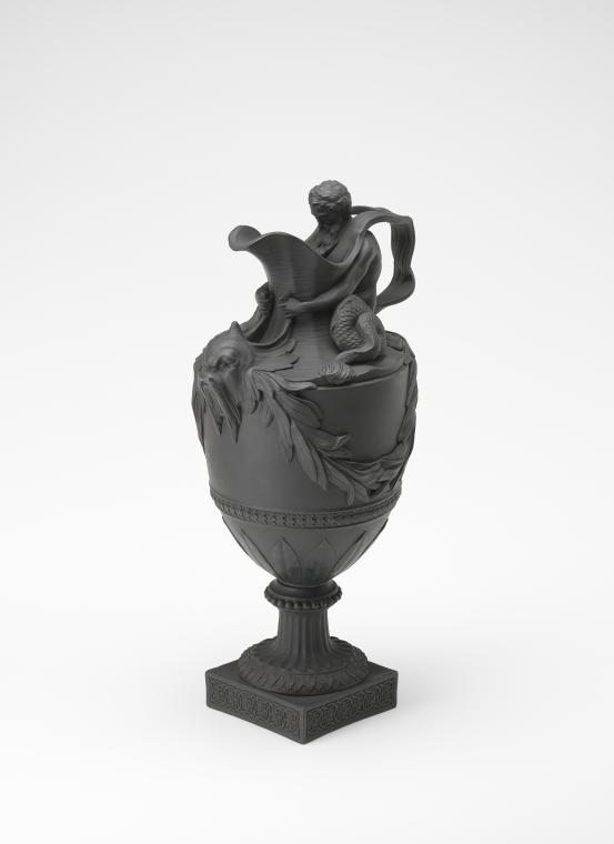 WEDGWOOD, Staffordshire, Stoke-on-Trent (manufacturer)<br />
 John FLAXMAN (designer)<br/>
<em>Sacred to Neptune, ewer</em> (c. 1860-1870) <!-- (recto) --><br />

stoneware (black basalt)<br />
43.7 x 22.3 x 17.2 cm<br />
National Gallery of Victoria, Melbourne<br />
Felton Bequest, 1915<br />
1783-D3<br />

<!--17170--><br/><a class="col-link block" href="/explore/collection/work/17170"><strong>Collection page <i class="fa fa-angle-right"></i></strong></a>