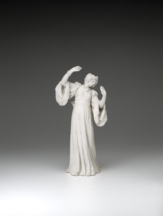 S&Egrave;VRES PORCELAIN FACTORY, S&egrave;vres (manufacturer)<br />
 Agathon L&Eacute;ONARD (modeller)<br/>
<em>Dancer with bracelet, from The Scarf Dance table centrepiece, model no. 3</em> 1898 {modelled}; (1903) {manufactured} <!-- (front) --><br />
<em>(Danseuse au bracelet, from the table centrepiece Le Jeu de L&rsquo;&Eacute;charpe)</em><br />
porcelain (biscuit, hard paste)<br />
45.2 x 21.8 x 17.1 cm<br />
National Gallery of Victoria, Melbourne<br />
Gift of Krystyna Campbell-Pretty AM and Family through the Australian Government's Cultural Gifts Program, 2021<br />
2021.535<br />

<!--146190-->