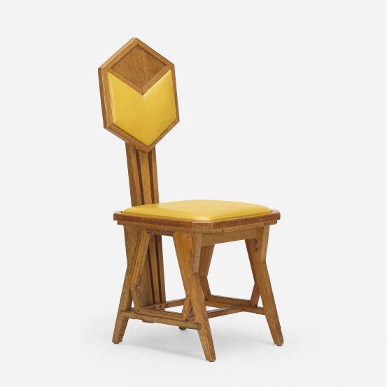 Frank Lloyd WRIGHT (designer)<br />
 MATSU-ZUKAYA COMPANY, Tokyo (manufacturer)<br/>
<em>Peacock chair, from the Imperial Hotel, Tokyo</em> (1921) {designed}; (1921-1922) {manufactured} <!-- () --><br />

Oak (Quercus sp.), vinyl, brass<br />
97.0 x 39.6 x 48.2 cm<br />
National Gallery of Victoria, Melbourne<br />
Purchased with funds donated by Joe White Bequest and donors to the Frank Lloyd Wright Appeal, 2021<br />
2021.147<br />
&copy; Frank Lloyd Wright Estate/ARS, New York. Licensed by Copyright Agency, Australia
<!--145465-->