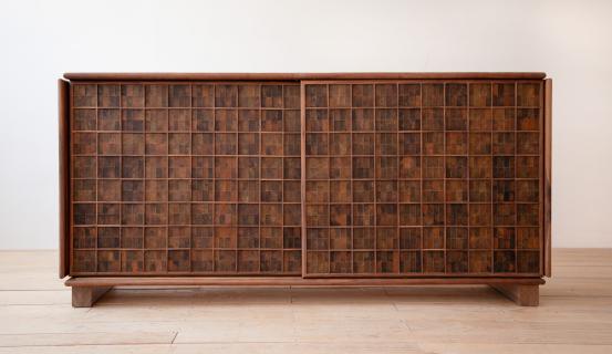 Fernando LAPOSSE<br/>
<em>Avocado leather cabinet</em> (2023) <!-- (installation) --><br />
from the <i>Conflict Avocados</i> project 2023<br />
avocado skin, Walnut (Juglans sp.), plywood, steel, brass<br />
92.8 x 194.5 x 50.3 cm<br />
National Gallery of Victoria, Melbourne<br />
Commissioned by the National Gallery of Victoria, Melbourne. Purchased with funds donated by The Andrew & Geraldine Buxton Foundation, 2024<br />
2024.157<br />
&copy; Fernando Laposse
<!--151168-->