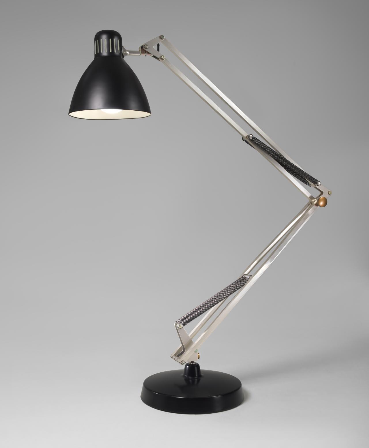 Gaetano PESCE (designer)<br />
 BRACCIODIFERRO S.R.L., Genoa (manufacturer)<br/>
<em>Prototype no. 000-F for Moloch, floor lamp</em> (1971-1972) {designed and manufactured} <!-- (view 1) --><br />

anodised aluminum, painted aluminum, aluminum, steel, painted steel, wood, electrical components<br />
291.5 x 233.5 x 86.2 cm (variable) (installed)<br />
National Gallery of Victoria, Melbourne<br />
Marjorie Josephs-Wilks Bequest, 2025<br />
2025.529<br />

<!--156961-->