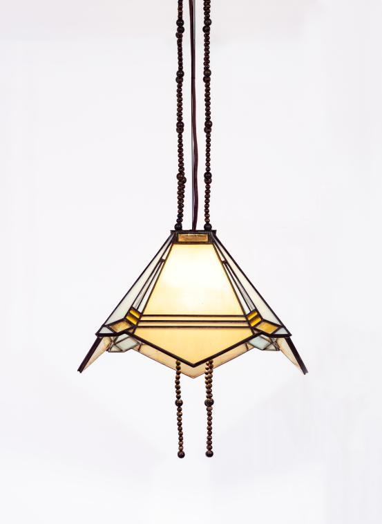 Frank Lloyd WRIGHT (designer)<br/>
<em>Pendant light, from the Arthur B. Heurtley House, Oak Park, Illinois</em> (c. 1902) <!-- (full view) --><br />

glass, gilt-glass, zinc, bronze (patinated)<br />
(28.0 x 44.0 x 44.0 cm)<br />
National Gallery of Victoria, Melbourne<br />
Gift of Krystyna Campbell-Pretty AM and Family through the Australian Government's Cultural Gifts Program, 2025<br />
2025.518<br />
&copy; Frank Lloyd Wright Estate/ARS, New York. Licensed by Copyright Agency, Australia
<!--156144-->