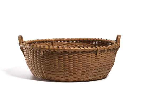 UNITED STATES, New England (manufacturer)<br/>
<em>Gathering basket</em> (late 19th century) <!-- (view 3) --><br />

Black ash (Fraxinus nigra)<br />
22.2 x 59.4 x 58.7 cm<br />
National Gallery of Victoria, Melbourne<br />
Marjorie Josephs-Wilks Bequest, 2025<br />
<br />

<!--157931-->