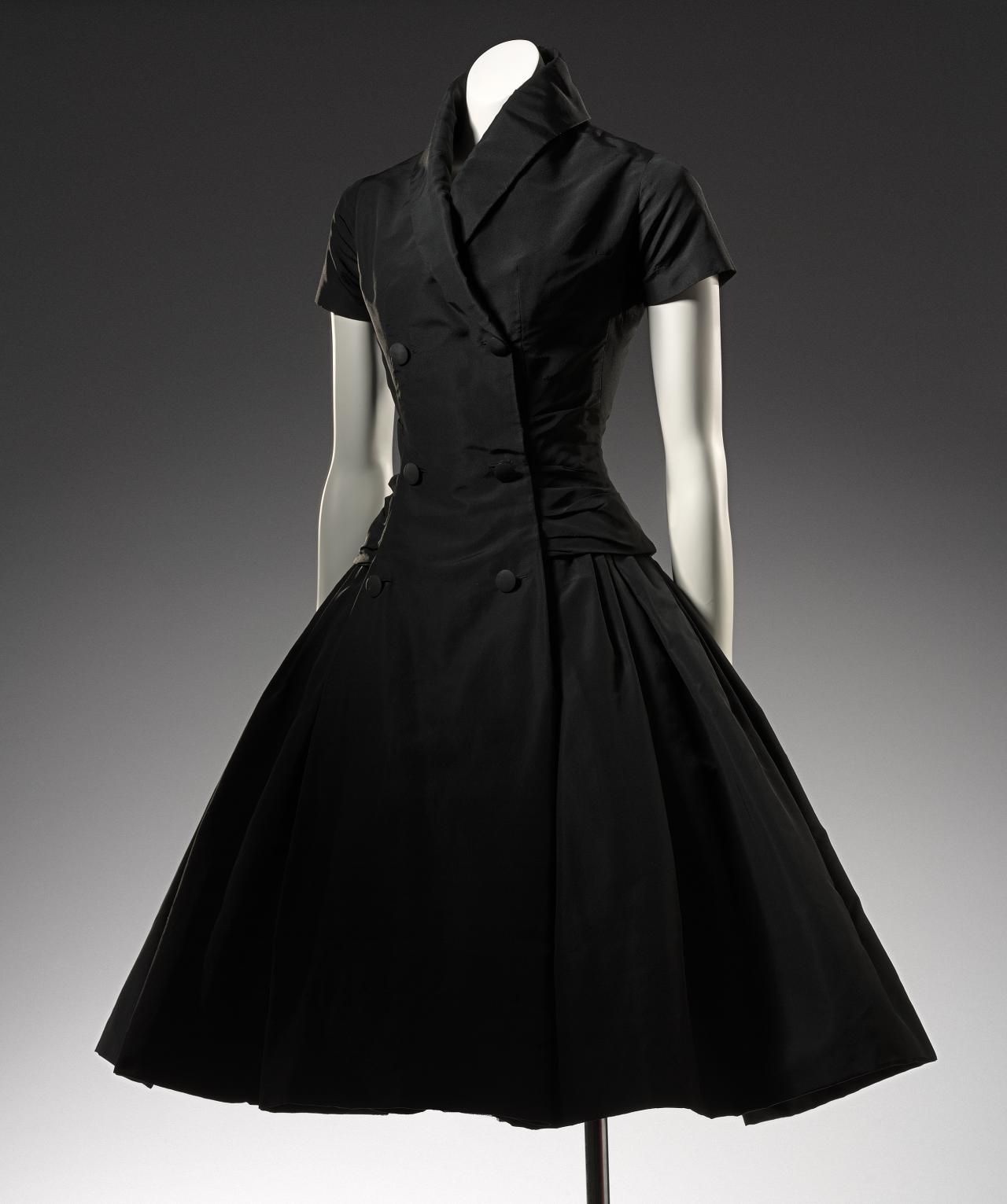 CHRISTIAN DIOR, Paris (couture house)<br />
 Christian DIOR (designer)<br/>
<em>Zelie, cocktail dress</em> 1954 {H line, autumn-winter 1954–55} <!-- (front view) --><br />

silk<br />
122.0 cm (centre back) 32.0 cm (waist, flat)<br />
National Gallery of Victoria, Melbourne<br />
Purchased NGV Foundation, 2006<br />
2006.488<br />
© Christian Dior Couture
<!--83173-->