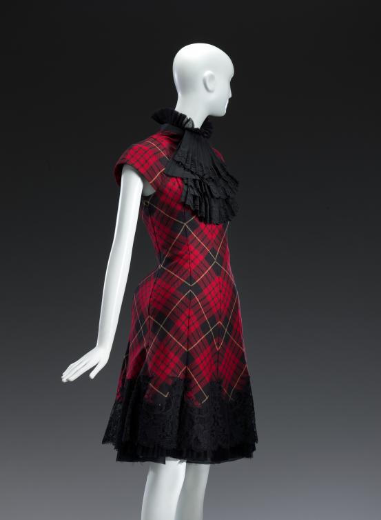 ALEXANDER MCQUEEN, London (fashion house)<br />
 Alexander McQUEEN (designer)<br/>
<em>Look 30, dress</em> 2006 {Widows of Culloden collection, autumn-winter 2006&ndash;07} <!-- (front 3/4) --><br />

wool, cotton, silk, metal (fastening)<br />
115.5 cm (centre back) 32.0 cm (waist, flat)<br />
National Gallery of Victoria, Melbourne<br />
Gift of Krystyna Campbell-Pretty and the Campbell-Pretty Family through the Australian Government&rsquo;s Cultural Gifts Program, 2018<br />
2018.1599<br />
&copy; Alexander McQueen
<!--136157-->