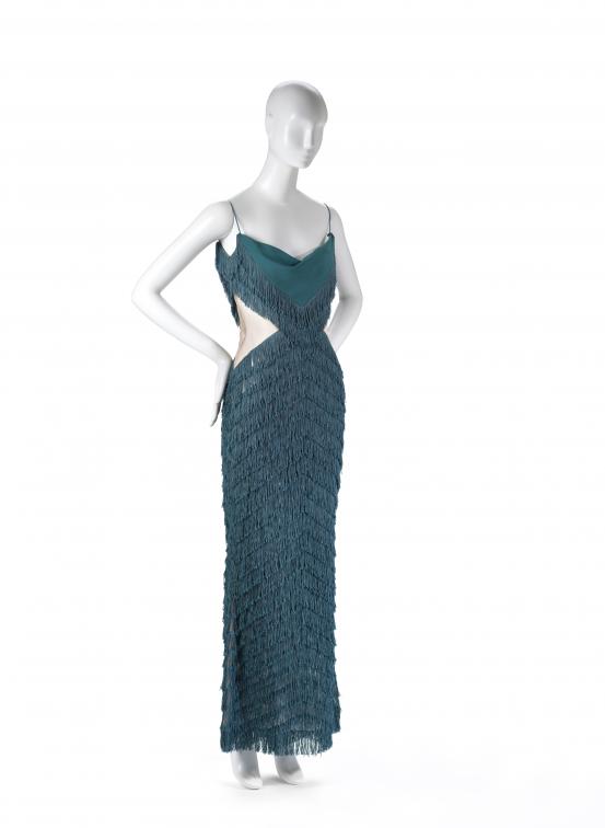 CHRISTIAN DIOR, Paris (fashion house)<br />
 John GALLIANO (designer)<br/>
<em>Evening dress</em> 1997 {In a boudoir mood ready-to-wear collection, spring-summer 1998} <!-- (front 3/4) --><br />

polyamide nylon<br />
125.0 cm (centre back) 35.0 cm (waist, flat)<br />
National Gallery of Victoria, Melbourne<br />
Gift of Krystyna Campbell-Pretty AM and Family through the Australian Government&rsquo;s Cultural Gift&rsquo;s Program, 2020<br />
2020.610<br />
&copy; Christian Dior
<!--143142--><br/><a class="col-link block" href="/explore/collection/work/143142"><strong>Collection page <i class="fa fa-angle-right"></i></strong></a>