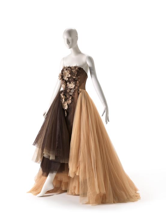 CHRISTIAN DIOR, Paris (fashion house)<br />
 John GALLIANO (designer)<br/>
<em>Evening dress</em> 2011 {Ren&eacute; Gruau collection spring-summer 2011} <!-- (front 3/4) --><br />

silk (organza, satin), polyester, feathers, glass (beads), plastic (sequins), metal (buttons, fastenings)<br />
156.0 cm (centre back) 36.0 cm (waist, flat)<br />
National Gallery of Victoria, Melbourne<br />
Gift of Krystyna Campbell-Pretty AM and Family through the Australian Government&rsquo;s Cultural Gifts Program, 2021<br />
2021.632<br />
&copy; Christian Dior
<!--146174--><br/><a class="col-link block" href="/explore/collection/work/146174"><strong>Collection page <i class="fa fa-angle-right"></i></strong></a>