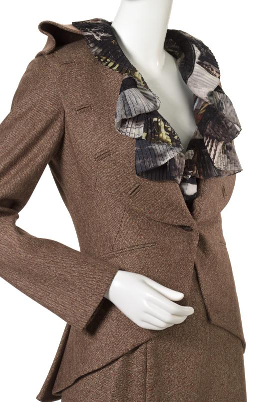 ALEXANDER MCQUEEN, London (fashion house)<br />
 Alexander McQUEEN (designer)<br/>
<em>Shirt</em> 2006 {The widows of Culloden collection, autumn-winter 2006&ndash;07} <!-- (front 3/4) --><br />

silk, polyamide<br />
89.0 cm (centre back) 61.0 cm (sleeve length)<br />
National Gallery of Victoria, Melbourne<br />
Purchased with funds donated by Krystyna Campbell-Pretty AM and Family, 2022<br />
2022.772<br />
&copy; Alexander McQueen
<!--149104-->