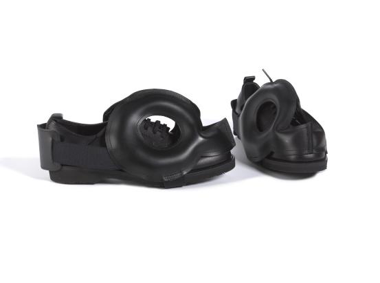 COMME DES GAR&Ccedil;ONS, Tokyo (fashion house)<br />
 Rei KAWAKUBO (designer)<br/>
<em>Shoes and shoe covers</em> 2014 {Not Making Clothing collection, spring-summer 2014} <!-- (view 1) --><br />

leather, cotton, synthetic fabric<br />
(a-b) 11.0 x 10.0 x 26.0 cm (each) (shoes) (c-d) 13.5 x 11.0 x 28.0 cm (each) (shoe covers)<br />
National Gallery of Victoria, Melbourne<br />
Gift of Takamasa Takahashi and David Tune, 2025<br />
2025.446.a-d<br />

<!--155429-->