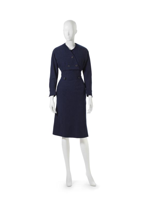 CHRISTIAN DIOR, Paris (couture house)<br />
 Christian DIOR (designer)<br/>
<em>Fr&eacute;d&eacute;rique, spencer and dress</em> 1951 {Long line, autumn-winter 1951&ndash;52} <!-- (front) --><br />

wool, silk (crepe, plain), linen, plastic and metal (fastenings)<br />
(a) 101.0 cm (centre back) 30.0 cm (waist, flat) (dress) (b) 34.0 cm (centre back) 46.0 cm (sleeve length) (spencer)<br />
National Gallery of Victoria, Melbourne<br />
Gift of Krystyna Campbell-Pretty AM and Family through the Australian Government&rsquo;s Cultural Gift Program, 2024<br />
2024.1033.a-b<br />

<!--155446--><br/><a class="col-link block" href="/explore/collection/work/155446"><strong>Collection page <i class="fa fa-angle-right"></i></strong></a>