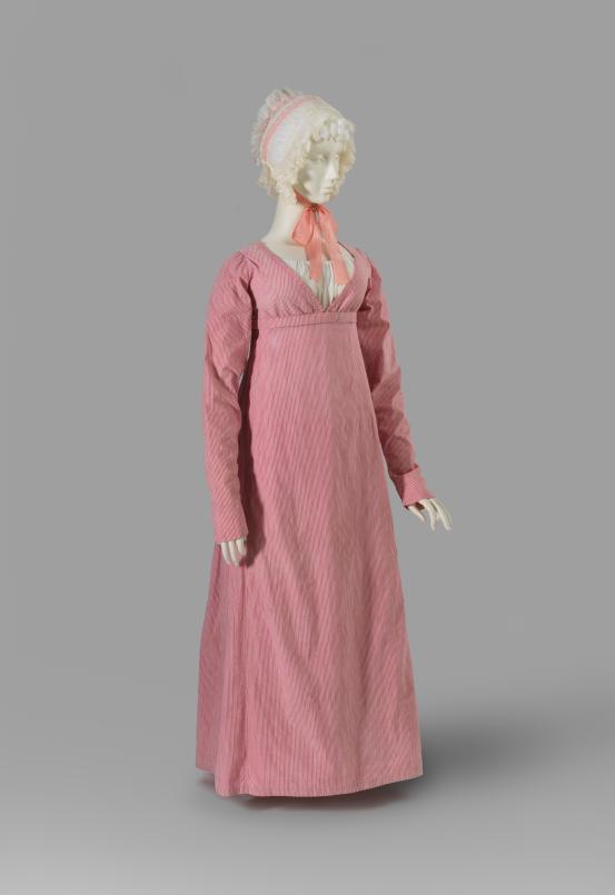 (ENGLAND)<br/>
<em>Spencer, petticoat and cap</em> (c. 1807-c. 1809) <!-- (full view) --><br />

cotton (plain, tape, voile, muslin, lace)<br />
(a) 23.0 cm (centre back) 63.0 cm (sleeve length) (spencer) (b)105.0 cm (centre back) 31.0 cm (waist, flat) (petticoat) (c) 28.0 x 26.0 x 20.0 cm (cap)<br />
National Gallery of Victoria, Melbourne<br />
Gift of Krystyna Campbell-Pretty AM and Family through the Australian Government&rsquo;s Cultural Gift Program, 2025<br />
2025.732.a-c<br />

<!--156856-->