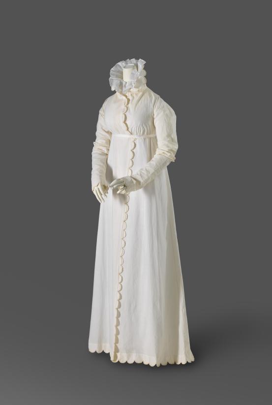 (FRANCE)<br/>
<em>Redingote and shawl</em> (1808-1812) <!-- (full view) --><br />

cotton, silk<br />
(a) 152.0 cm (centre back) 63.0 cm (sleeve length) (redingote) (b) 129.0 x 218.0 cm (shawl)<br />
National Gallery of Victoria, Melbourne<br />
Gift of Krystyna Campbell-Pretty AM and Family through the Australian Government&rsquo;s Cultural Gift Program, 2025<br />
2025.734.a-b<br />

<!--156859-->