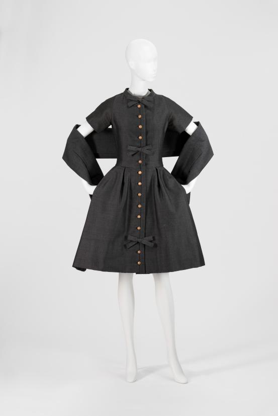 CHRISTIAN DIOR, Paris (couture house)<br />
 Yves SAINT LAURENT (designer)<br/>
<em>Sophie, dress and wrap</em> 1958 {Trapeze line, spring-summer 1958} <!-- (full view) --><br />

wool, alpaca, silk (plain, organza), silk linen, nylon (tulle), metal and plastic (fastenings)<br />
(a) 100.0 cm (centre back) 30.0 cm (waist, flat) (dress) (b) 33.0 x 161.0 cm (wrap)<br />
National Gallery of Victoria, Melbourne<br />
Gift of Krystyna Campbell-Pretty AM and Family through the Australian Government&rsquo;s Cultural Gift Program, 2024<br />
2024.1036.a-b<br />

<!--155472--><br/><a class="col-link block" href="/explore/collection/work/155472"><strong>Collection page <i class="fa fa-angle-right"></i></strong></a>