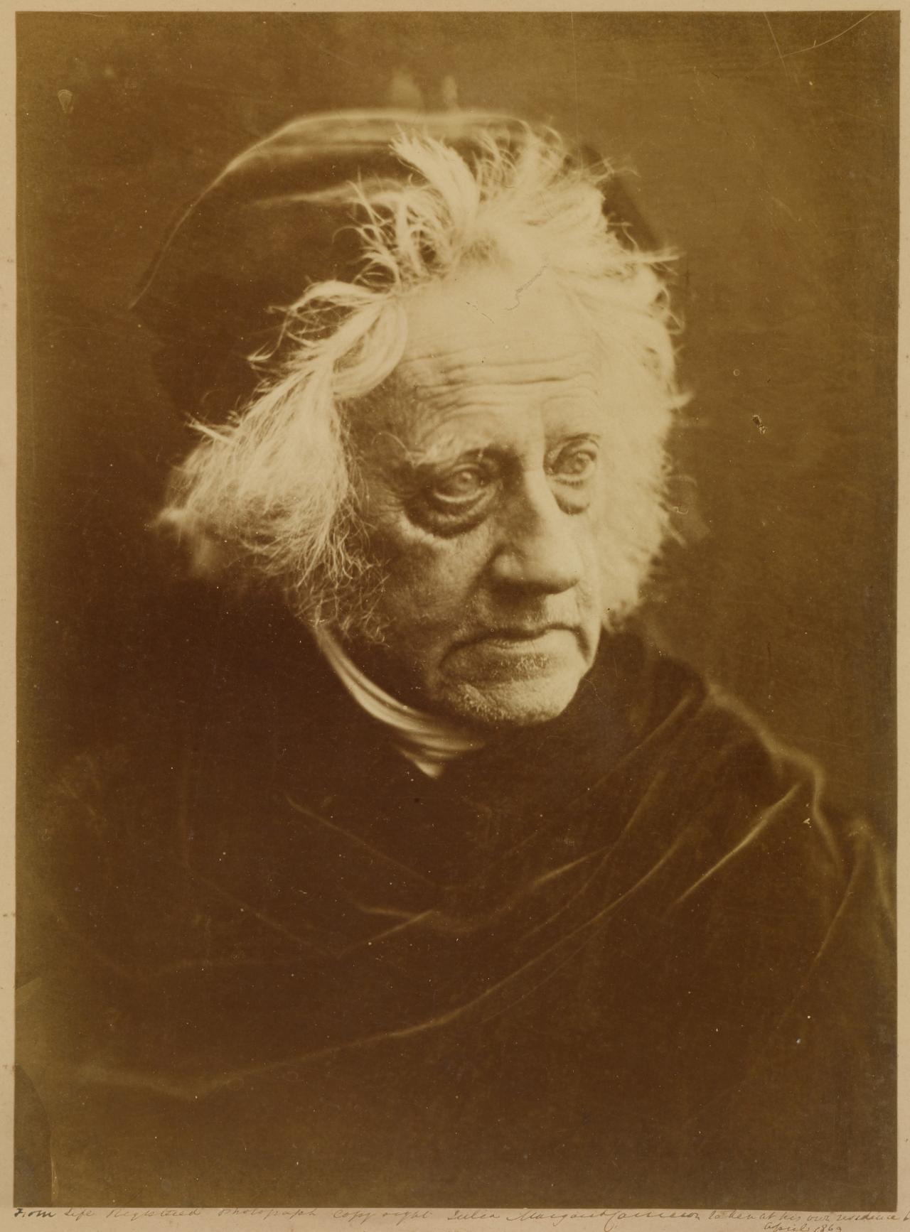 Julia Margaret CAMERON<br/>
<em>Sir J. F. W. Herschel</em> 1869 <!-- (image only) --><br />

albumen silver photograph<br />
32.4 x 23.8 cm (image and sheet) 36.5 x 28.1 cm (comp.)<br />
National Gallery of Victoria, Melbourne<br />
Felton Bequest, 1977<br />
PH67-1977<br />

<!--8522-->