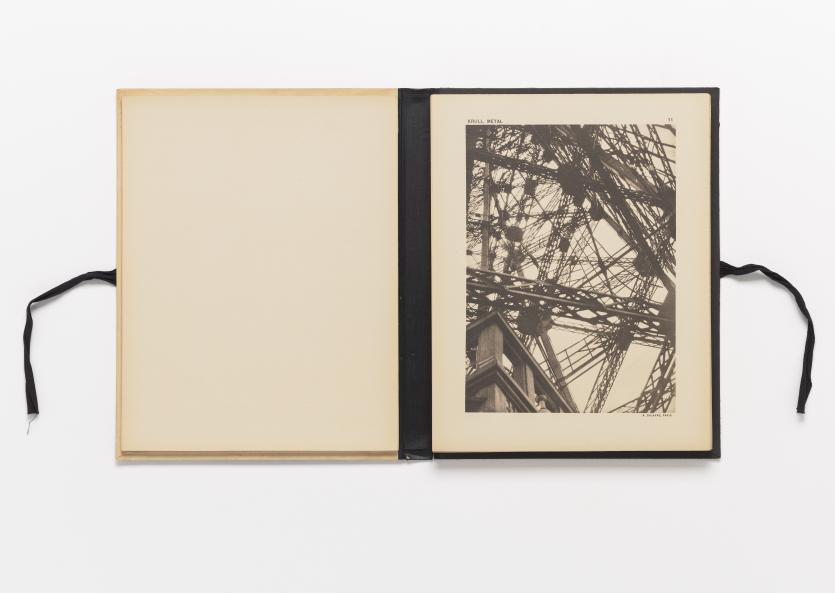 Germaine KRULL<br/>
<em>Metal</em> (1928) <!-- (page) --><br />
<em>(M&eacute;tal)</em><br />
64 black and white collotype plates, letterpress on paper, black cloth-backed paper-covered board portfolio with ribbons<br />
30.5 x 23.5 x 2.5 cm (overall)<br />
National Gallery of Victoria, Melbourne<br />
Bowness Family Fund for Photography, 2023<br />
2023.336<br />
&copy; Estate of Germaine Krull
<!--150864-->

