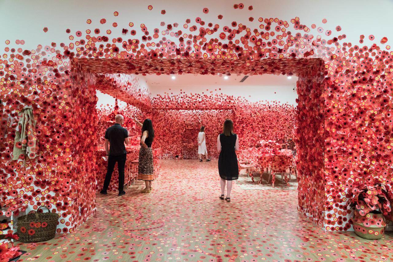 Yayoi KUSAMA<br/>
<em>Flower Obsession</em> (2016-2017) <!-- (installation view) --><br />

flower decals, fabric flowers, furniture, found objects<br />
330.0 x 1890.0 x 1480.0 cm (variable) (installation)<br />
ed. 1/3<br />
National Gallery of Victoria, Melbourne<br />
Purchased, NGV Women’s Association, 2018<br />
2017.1244.1<br />
© Yayoi Kusama, courtesy Ota Fine Arts, Tokyo
<!--131613-->