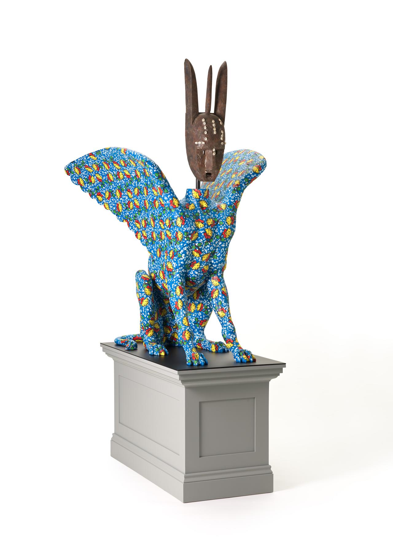 Yinka SHONIBARE<br/>
<em>Hybrid sculpture (Sphinx)</em> (2021) <!-- (front 3/4) --><br />

synthetic polymer paint on fibreglass, wood, shells, painted wood<br />
(a-b) 234.0 x 104.0 x 117.8 cm (overall)<br />
National Gallery of Victoria, Melbourne<br />
Purchased NGV Foundation, 2021<br />
2021.782.a-b<br />
© Yinka Shonibare. DACS/Copyright Agency, 2023
<!--148054-->