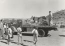 The Animal Industry float: man milking cut out cow, Jubilee Day Parade, Alice Springs